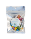 Packaged birthday-themed candy with a decorative label on a white background